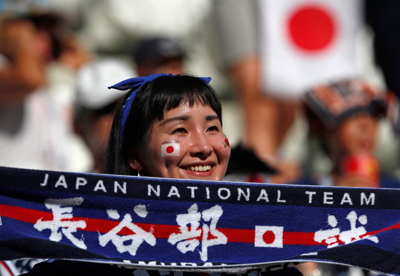 A Japanese supporter smiles before the group H match between Japan and Poland at the 2018 soccer World Cup at the Volgograd Arena in Volgograd, Russia, Thursday, June 28, 2018. (AP Photo/Darko Vojinovic)