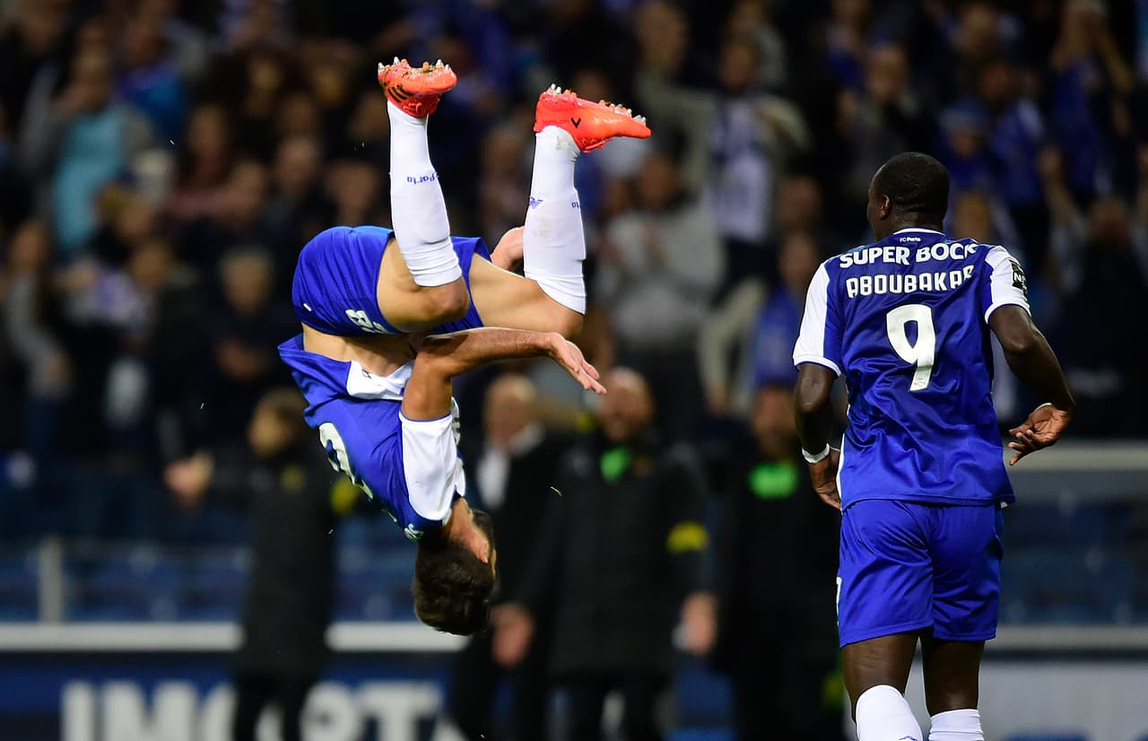 Porto's Brazilian defender Felipe (L) celebrates next to Cameroonian forward Vincent Aboubakar after scoring a goal during the Portuguese league football match FC Porto vs FC Pacos de Ferreira at the Dragao stadium in Porto on October 21, 2017. / AFP PHOTO / MIGUEL RIOPA (Photo credit should read MIGUEL RIOPA/AFP/Getty Images)