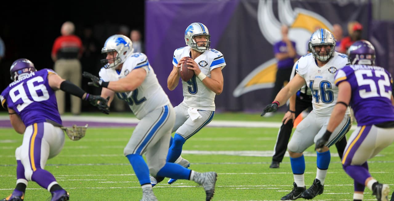 Detroit Lions quarterback Matthew Stafford, center, throws a pass during overtime in an NFL football game against the Minnesota Vikings Sunday, Nov. 6, 2016, in Minneapolis. The Lions won 22-16. (AP Photo/Andy Clayton-King)