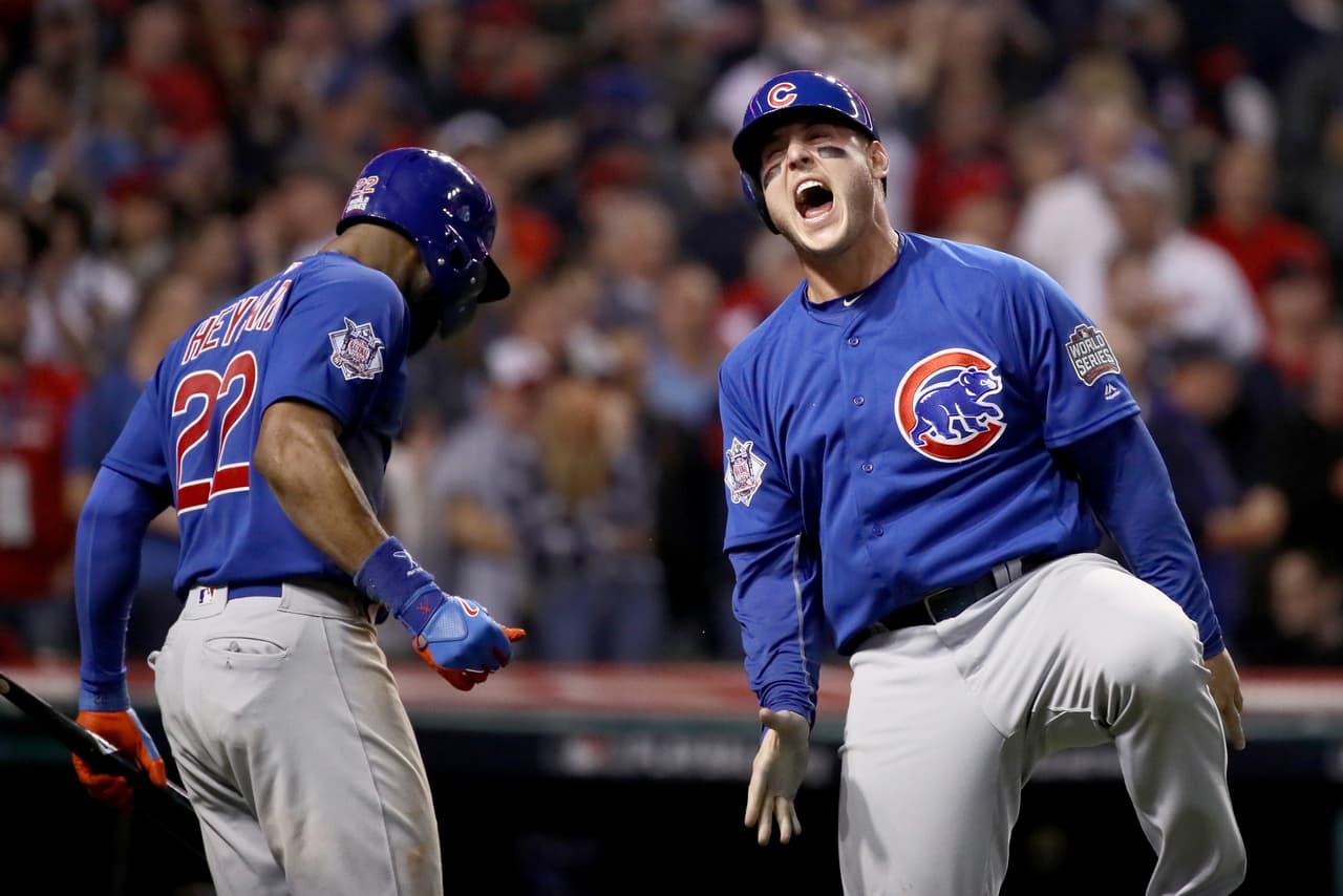 CLEVELAND, OH - NOVEMBER 02: Anthony Rizzo #44 of the Chicago Cubs celebrates with Jason Heyward #22 after Rizzo scores a run in the 10th inning on a Miguel Montero #47 against the Cleveland Indians in Game Seven of the 2016 World Series at Progressive Field on November 2, 2016 in Cleveland, Ohio. (Photo by Ezra Shaw/Getty Images)