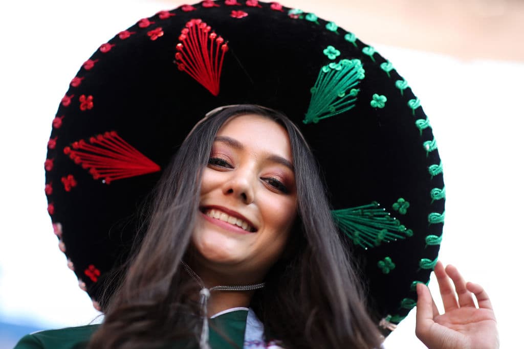 YEKATERINBURG, RUSSIA - JUNE 27: A Mexico fan enjoys the pre match prior to the 2018 FIFA World Cup Russia group F match between Mexico and Sweden at Ekaterinburg Arena on June 27, 2018 in Yekaterinburg, Russia. (Photo by Ryan Pierse/Getty Images)