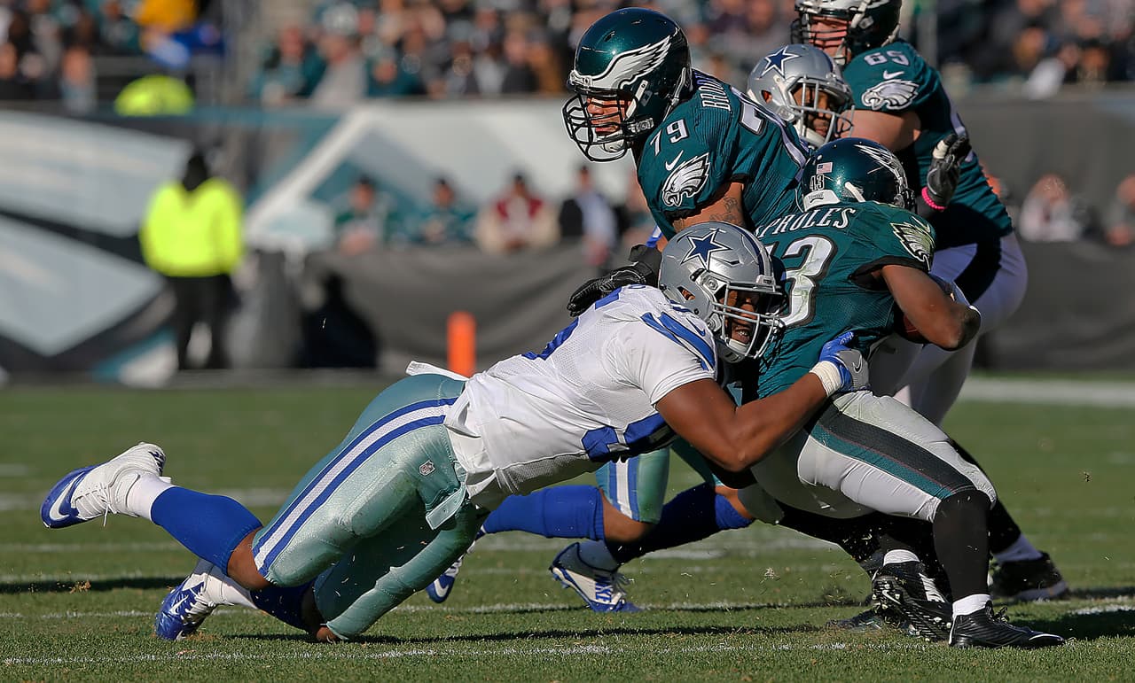 Dallas Cowboys defensive end David Irving (95) tackles Philadelphia Eagles running back Darren Sproles (43) during a 2016 NFL week 17 regular season game, Sunday, Jan. 1, 2017 in Philadelphia, Penn. The Eagles defeated the Cowboys, 27-13. (James D. Smith via AP)