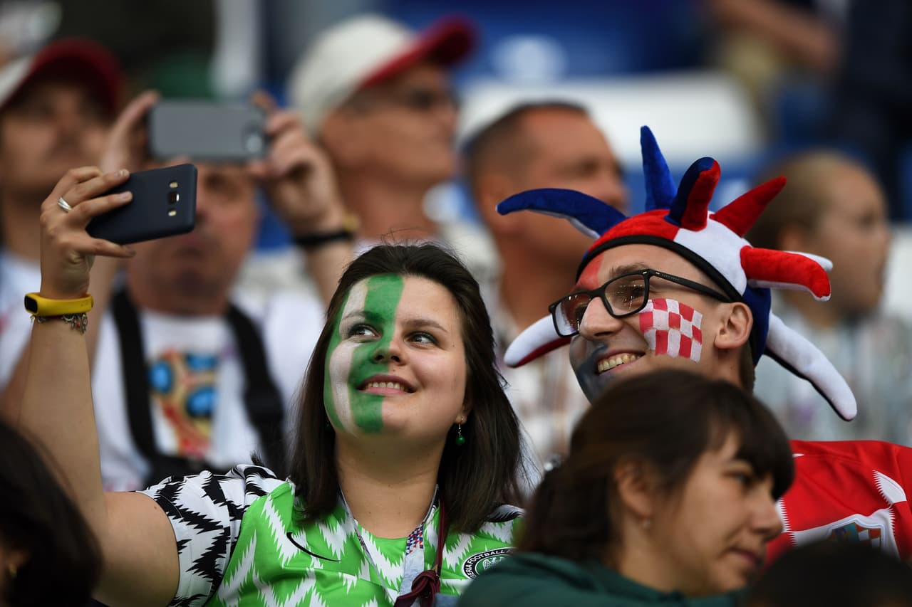 A Nigeria and a Croatia supporter take a selfie prior to the Russia 2018 World Cup Group D football match between Croatia and Nigeria at the Kaliningrad Stadium in Kaliningrad on June 16, 2018. (Photo by OZAN KOSE / AFP) / RESTRICTED TO EDITORIAL USE - NO MOBILE PUSH ALERTS/DOWNLOADS (Photo credit should read OZAN KOSE/AFP/Getty Images)