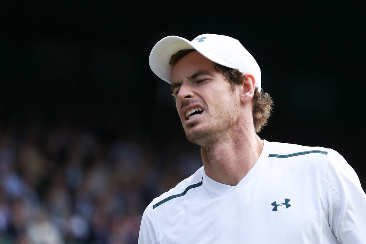 Britain's Andy Murray reacts after a point against US player Sam Querrey during their men's singles quarter-final match on the ninth day of the 2017 Wimbledon Championships at The All England Lawn Tennis Club in Wimbledon, southwest London, on July 12, 2017. / AFP PHOTO / Daniel LEAL-OLIVAS / RESTRICTED TO EDITORIAL USE (Photo credit should read DANIEL LEAL-OLIVAS/AFP/Getty Images)