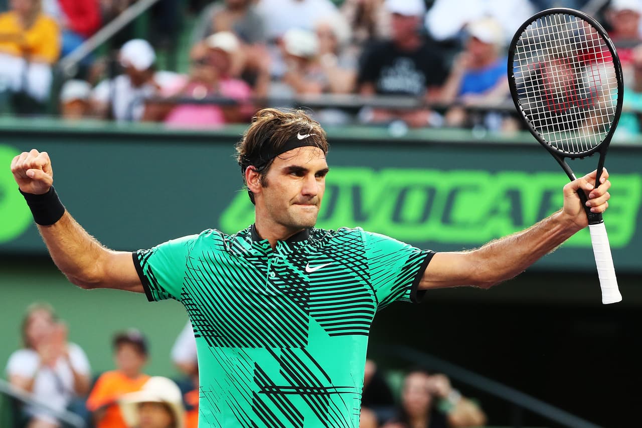KEY BISCAYNE, FL - MARCH 28: Roger Federer of Switzerland celebrates match point against Roberto Bautista Agut of Spain during Day 9 of the Miami Open at Crandon Park Tennis Center on March 28, 2017 in Key Biscayne, Florida. (Photo by Al Bello/Getty Images)
