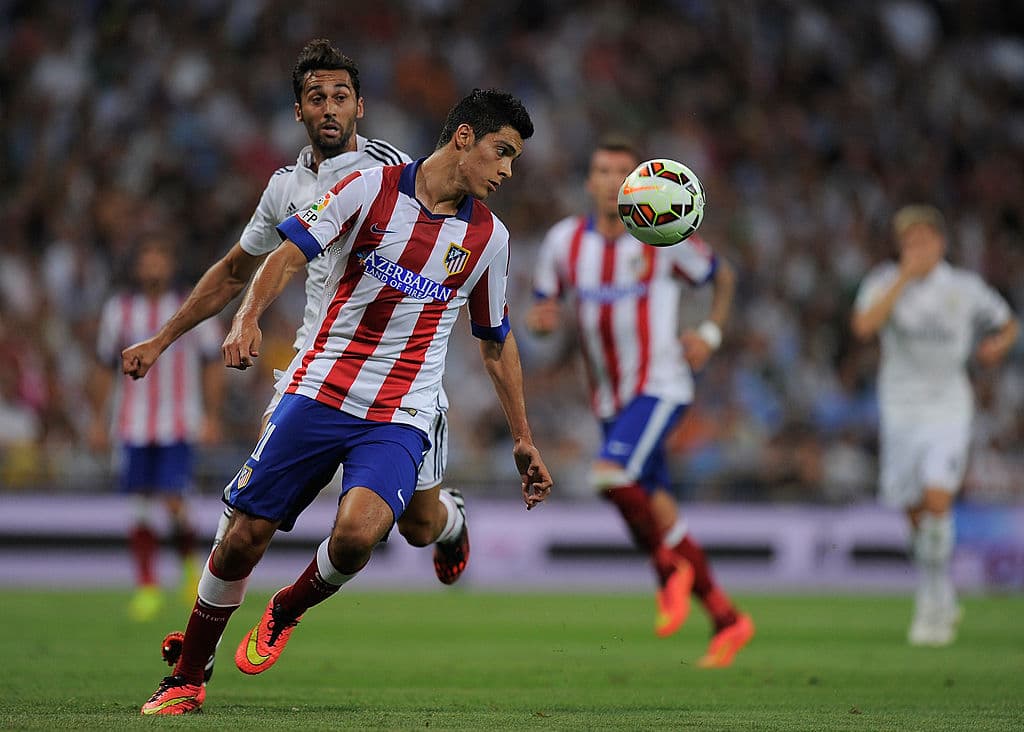 Jiménez, con 23 años, hizo su debut debut oficial con el Atlético en el Derbi Madrileño el 19 de agosto de 2014, en la Supercopa de España, el cuál perdieron 2-1.