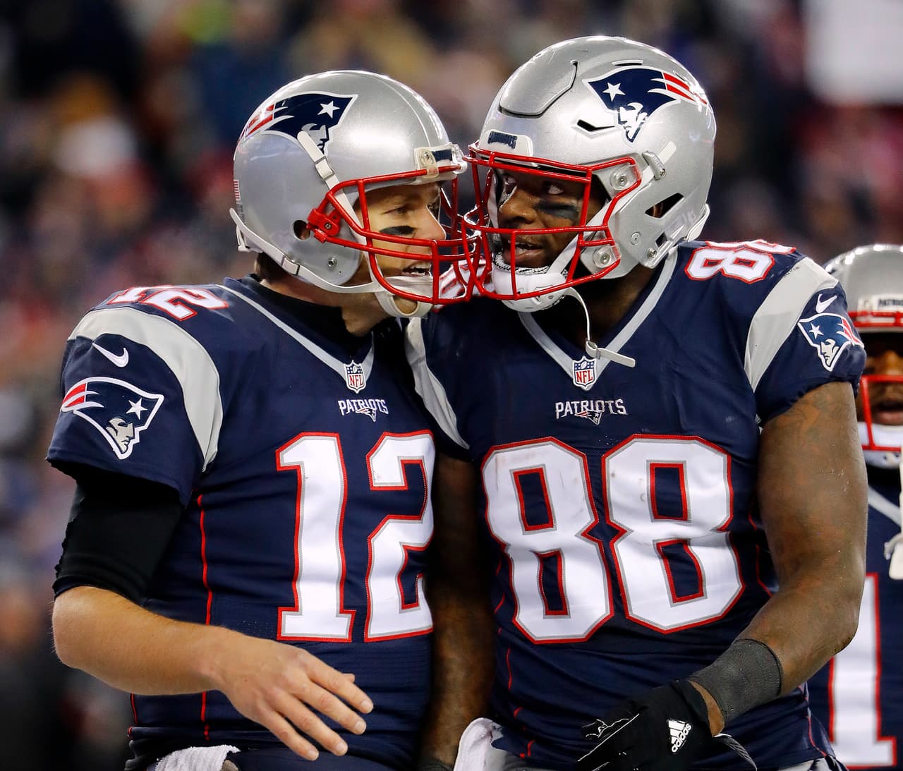 New England Patriots quarterback Tom Brady congratulates tight end Martellus Bennett after a touchdown against the Baltimore Ravens during an NFL football game at Gillette Stadium in Foxborough, Mass. Monday, Dec. 12, 2016. (Winslow Townson/AP Images for Panini)
