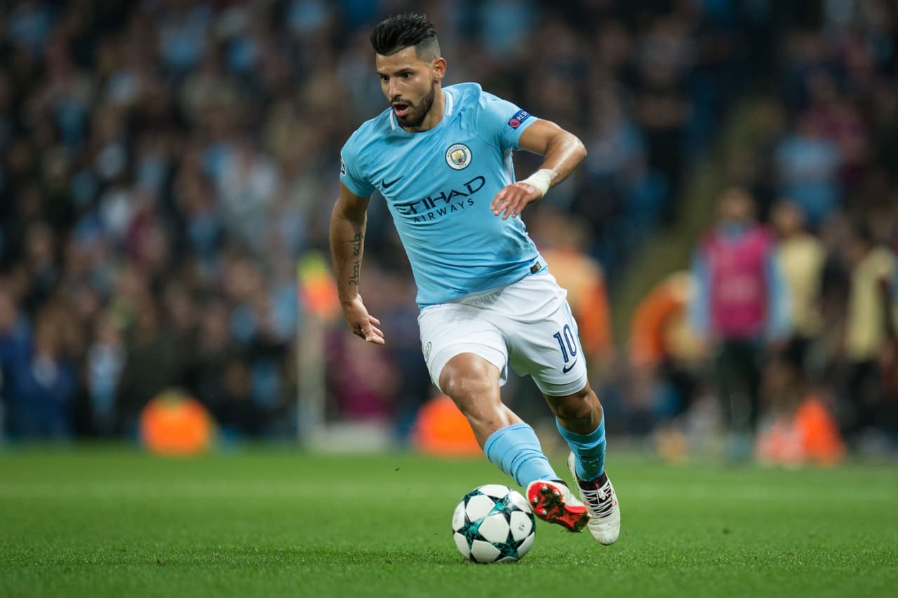 Manchester City's Argentinian striker Sergio Aguero runs with the ball during the Group F football match between Manchester City and Shakhtar Donetsk at the Etihad Stadium in Manchester, north west England, on September 26, 2017. / AFP PHOTO / OLI SCARFF (Photo credit should read OLI SCARFF/AFP/Getty Images)