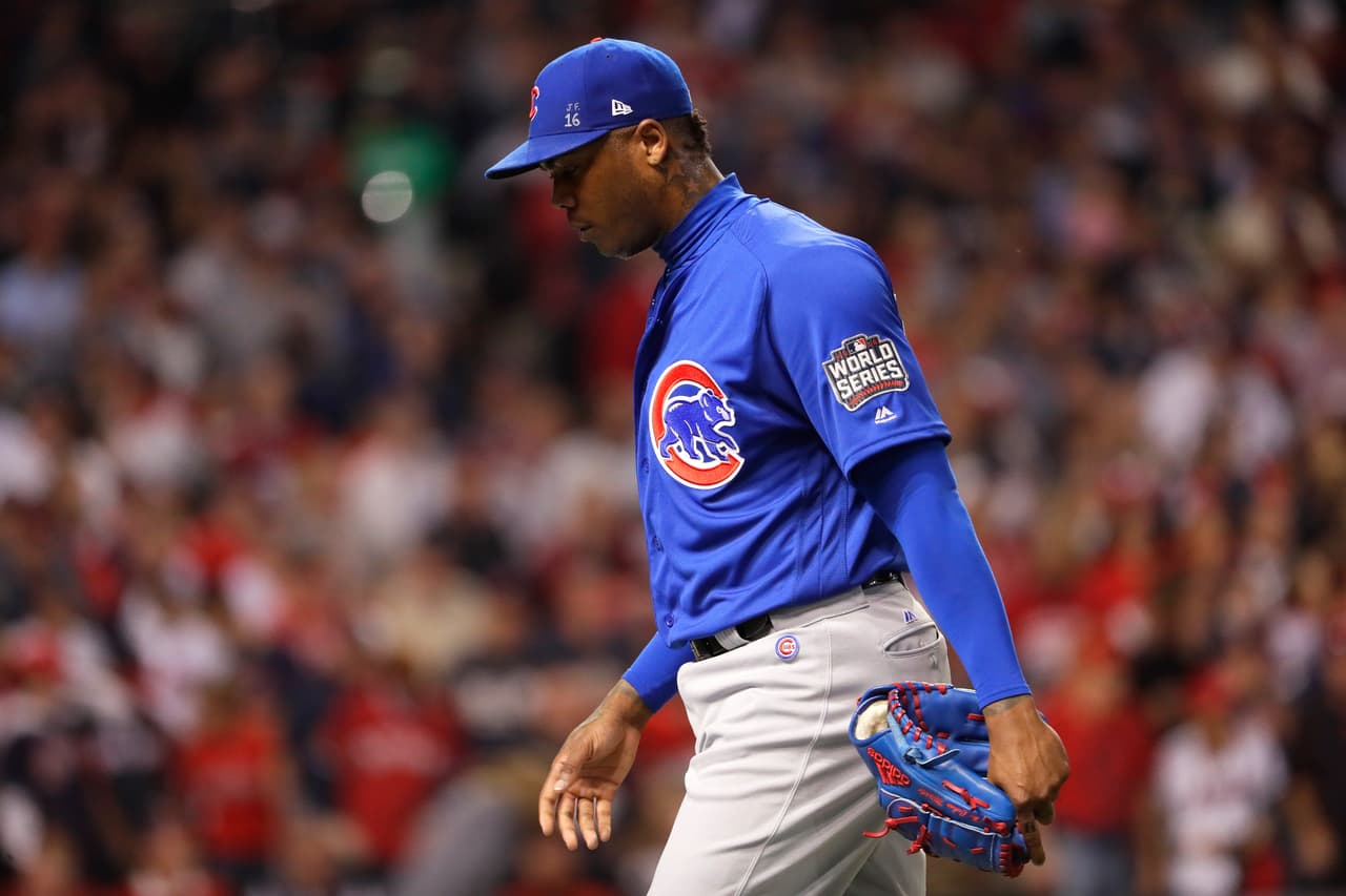 CLEVELAND, OH - NOVEMBER 01: Aroldis Chapman #54 of the Chicago Cubs walks back to the dugout after forcing out Francisco Lindor #12 of the Cleveland Indians (not pictured) at first base to end the seventh inning in Game Six of the 2016 World Series at Progressive Field on November 1, 2016 in Cleveland, Ohio. (Photo by Jamie Squire/Getty Images)