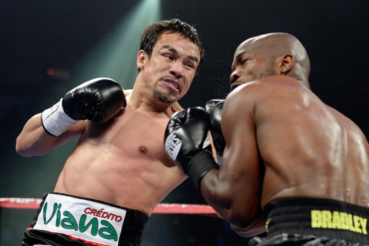 5. Juan Manuel Márquez (izquierda) superó los 30 millones de dólares en ganancias entre 2011 y 2014 en solo cuatro peleas ante Manny Pacquiao, dos contra Sergey Fedchenko y Timothy Bradley Jr.
