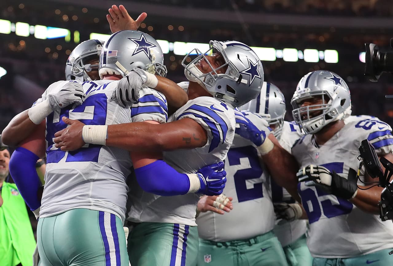 ARLINGTON, TX - OCTOBER 30: Jason Witten #82 of the Dallas Cowboys celebrates with Dak Prescott #4 of the Dallas Cowboys after scoring the game winning touchdown against the Philadelphia Eagles in overtime at AT&T Stadium on October 30, 2016 in Arlington, Texas. The Dallas Cowboys beat the Philadelphia Eagles 29-23 in overtime. (Photo by Tom Pennington/Getty Images)