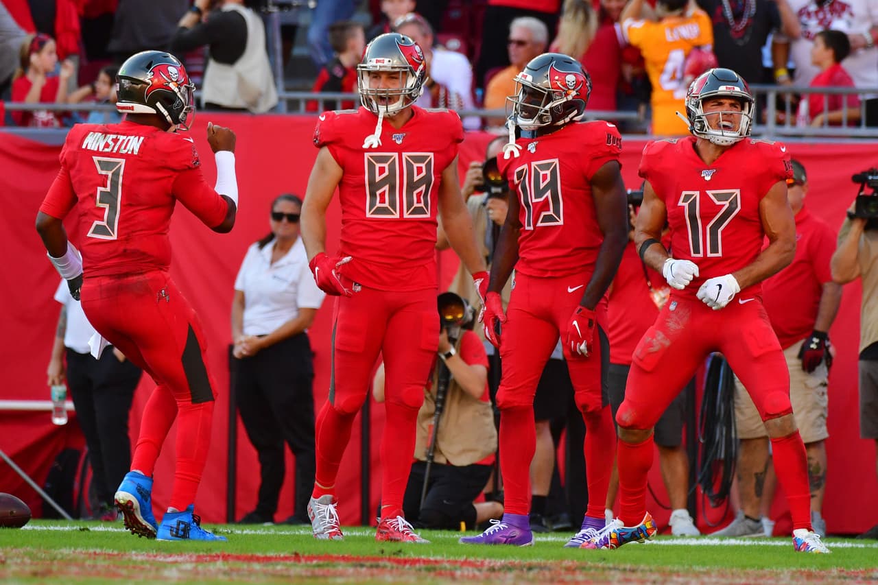 TAMPA, FLORIDA - DECEMBER 08: Jameis Winston #3, Tanner Hudson #88, Breshad Perriman #19, and Justin Watson #17 of the Tampa Bay Buccaneers celebrate after a touchdown during the fourth quarter of a football game against the Indianapolis Colts at Raymond James Stadium on December 08, 2019 in Tampa, Florida. (Photo by Julio Aguilar/Getty Images)