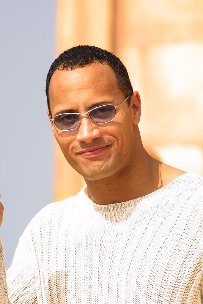 395220 07: (FILE PHOTO): Actor Dwayne Johnson (aka The Rock) smiles onstage as he promotes a special DVD and home video release of the movie "The Mummy Returns" October 3, 2001 in Santa Monica, CA. The Rock was ranked Number 19 by E! Online voters as one of the Top 20 Entertainers of 2001. (Photo by Jason Kirk/Getty Images)