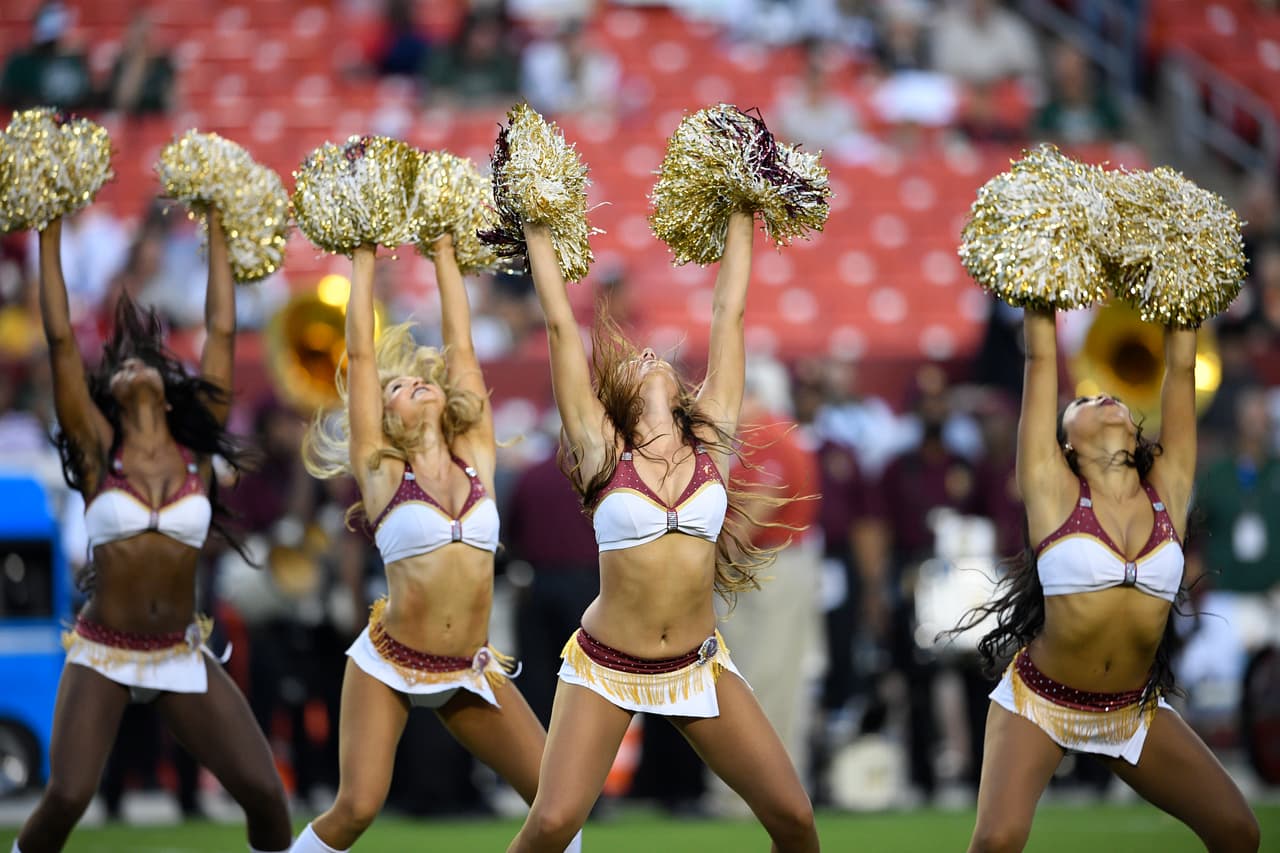 The Washington Redskins cheerleaders perform before a preseason NFL football game against the New York Jets, Thursday, Aug. 16, 2018, in Landover, Md. (AP Photo/Nick Wass)