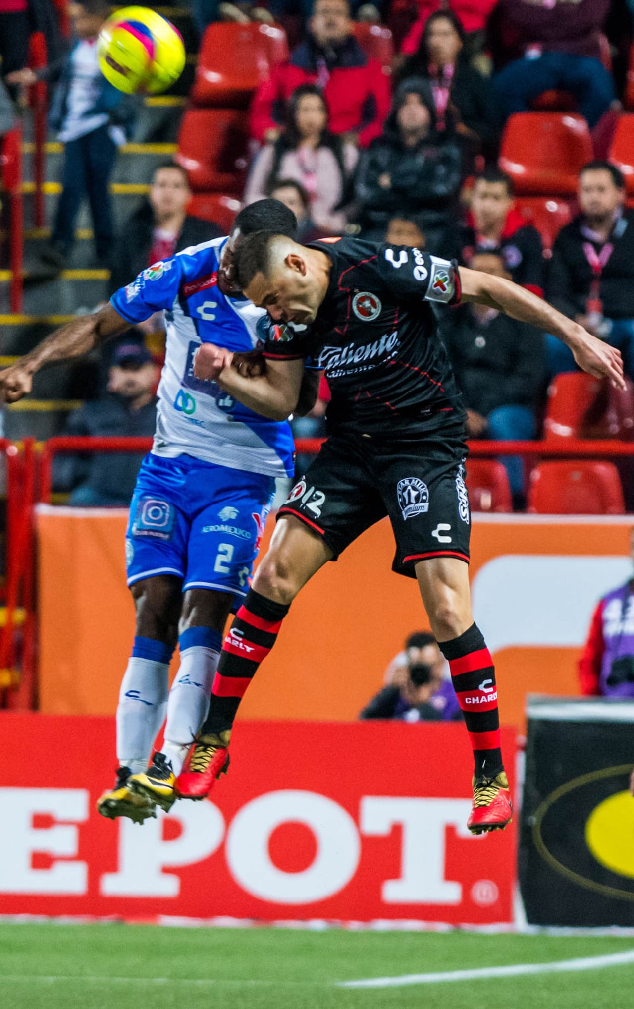 Action photo during the match Tijuana vs Puebla, Corresponding to Day 4 of the Closing Tournament 2018 of Liga BBVA Bancomer MX, at Caliente Stadium. Foto de accion durante el partido Tijuana vs Puebla, Correspondiente a la Jornada 4 del Torneo Clausura 2018 de la Liga BBVA Bancomer MX, en el Estadio Caliente, en la foto: Brayan Angulo de Puebla y Pablo AGuilar de Tijuana 26/01/2018/MEXSPORT/Emiliano.