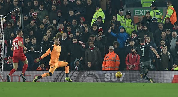 LIVERPOOL, ENGLAND - JANUARY 25: (THE SUN OUT, THE SUN ON SUNDAY OUT) Shane Long of Southampton Scores the winner during the EFL Cup Semi-Final second leg match between Liverpool and Southampton at Anfield on January 25, 2017 in Liverpool, England. (Photo by Andrew Powell/Liverpool FC via Getty Images)