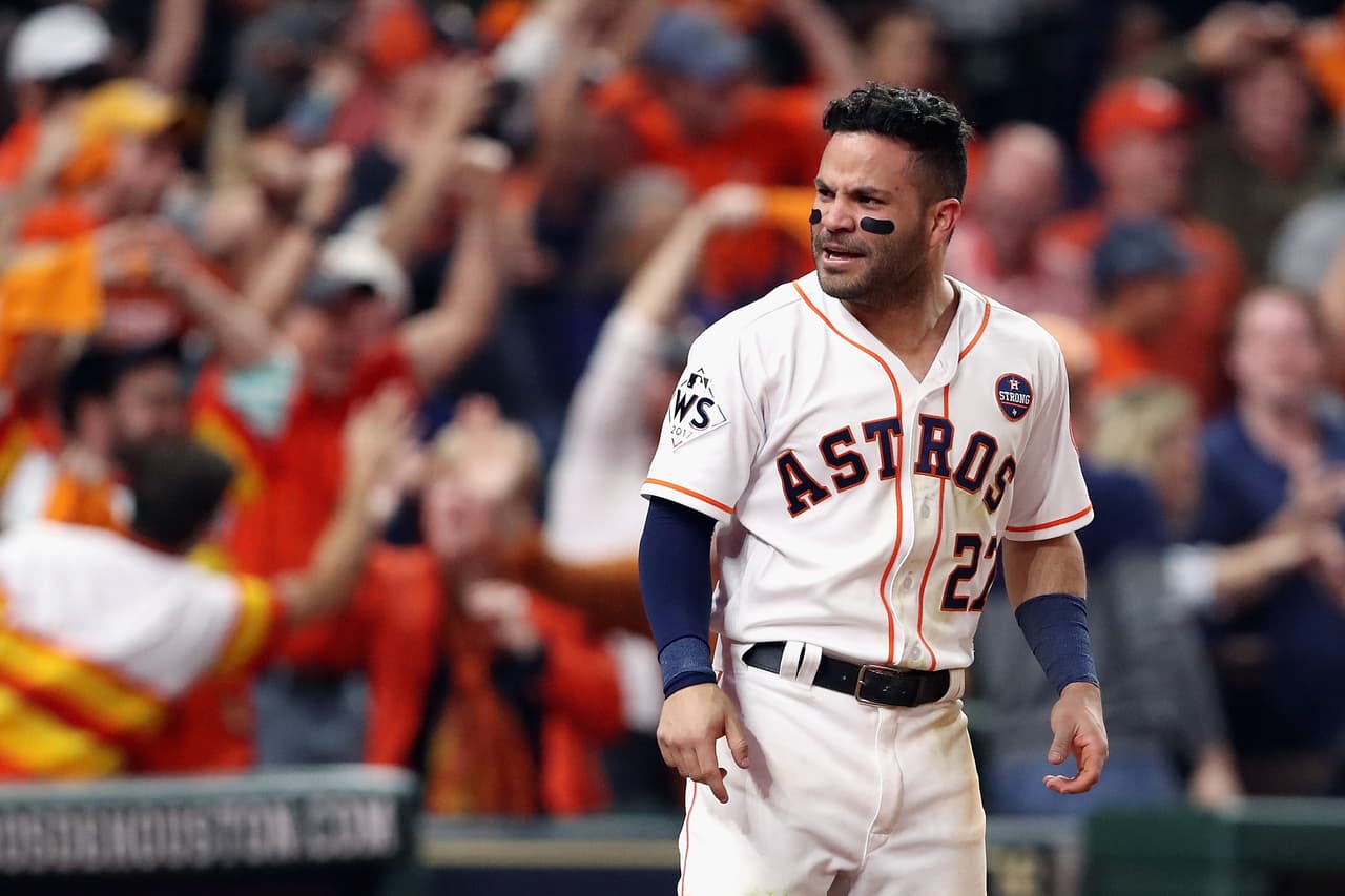 HOUSTON, TX - OCTOBER 29: Jose Altuve #27 of the Houston Astros celebrates after scoring on a home run by Carlos Correa #1 (not pictured) during the seventh inning against the Los Angeles Dodgers in game five of the 2017 World Series at Minute Maid Park on October 29, 2017 in Houston, Texas. (Photo by Christian Petersen/Getty Images)