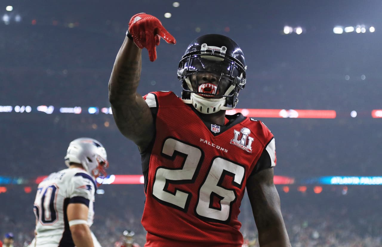 HOUSTON, TX - FEBRUARY 05: Tevin Coleman #26 of the Atlanta Falcons reacts after scoring a touchdown against the New England Patriots in the third quarter during Super Bowl 51 at NRG Stadium on February 5, 2017 in Houston, Texas. (Photo by Mike Ehrmann/Getty Images)