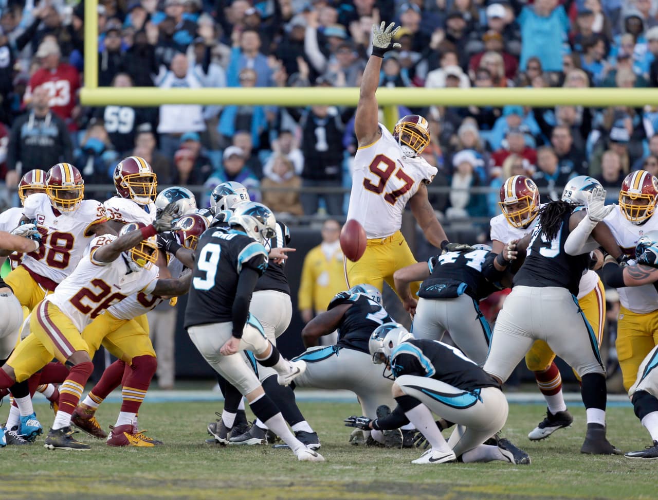 Cam Newton se lució con 5 pases de TD para que los Panthers mantuvieran su incontenible paso en la liga (10-0) al derrotar a los Redskins 44-16. Checa las mejores tomas del partido.