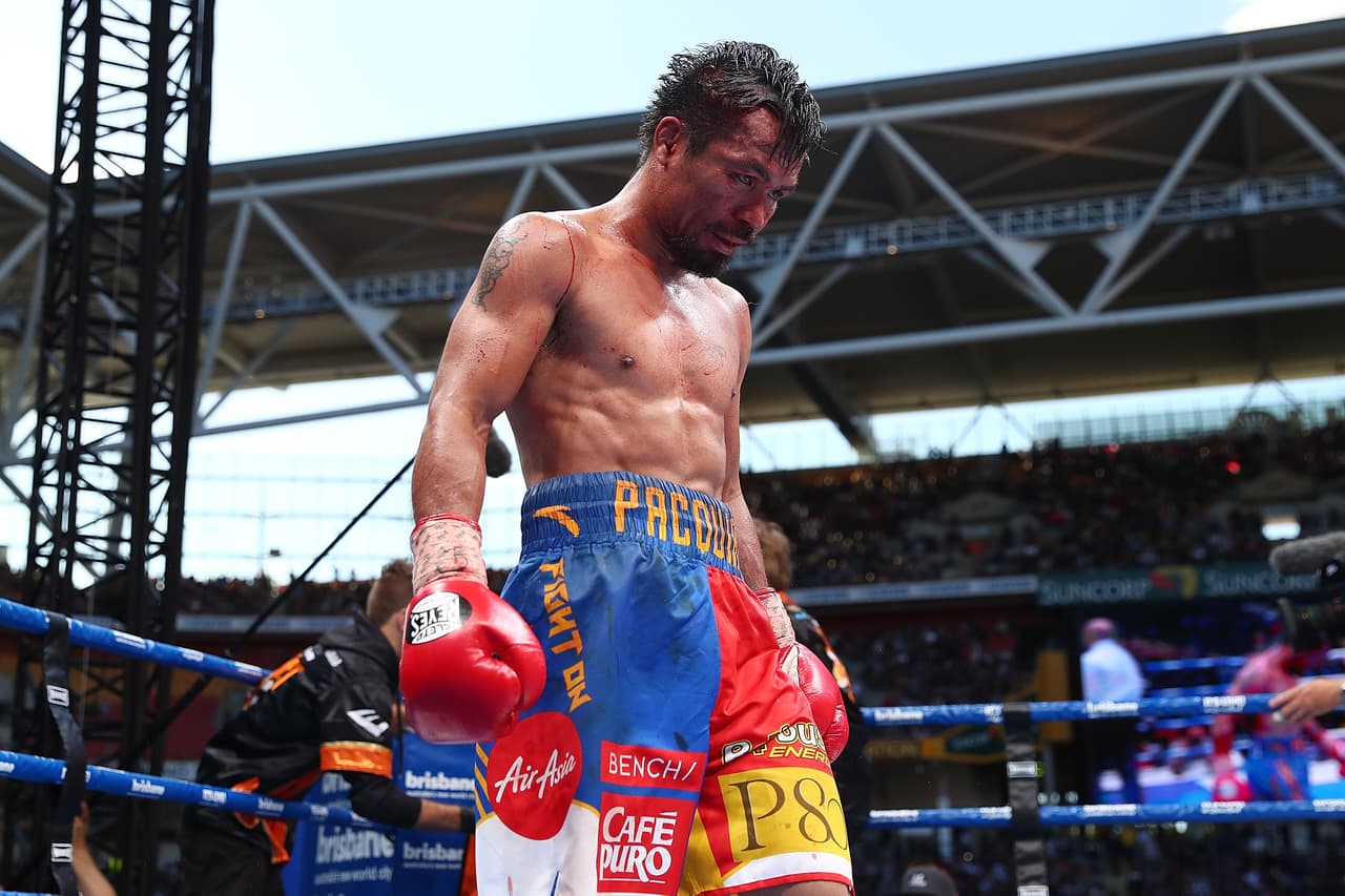 BRISBANE, AUSTRALIA - JULY 02: Manny Pacquiao of the Philippines walks back to his corner during the WBO World Welterweight Title Fight against Jeff Horn of Australia at Suncorp Stadium on July 2, 2017 in Brisbane, Australia. (Photo by Chris Hyde/Getty Images)