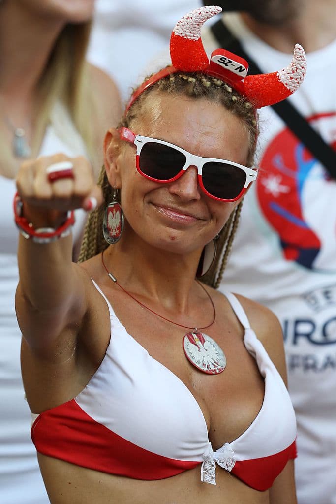 A Polish supporter cheers before the Euro 2016 quarter-final football match between Poland and Portugal at the Stade Velodrome in Marseille on June 30, 2016. / AFP / Valery HACHE (Photo credit should read VALERY HACHE/AFP/Getty Images)