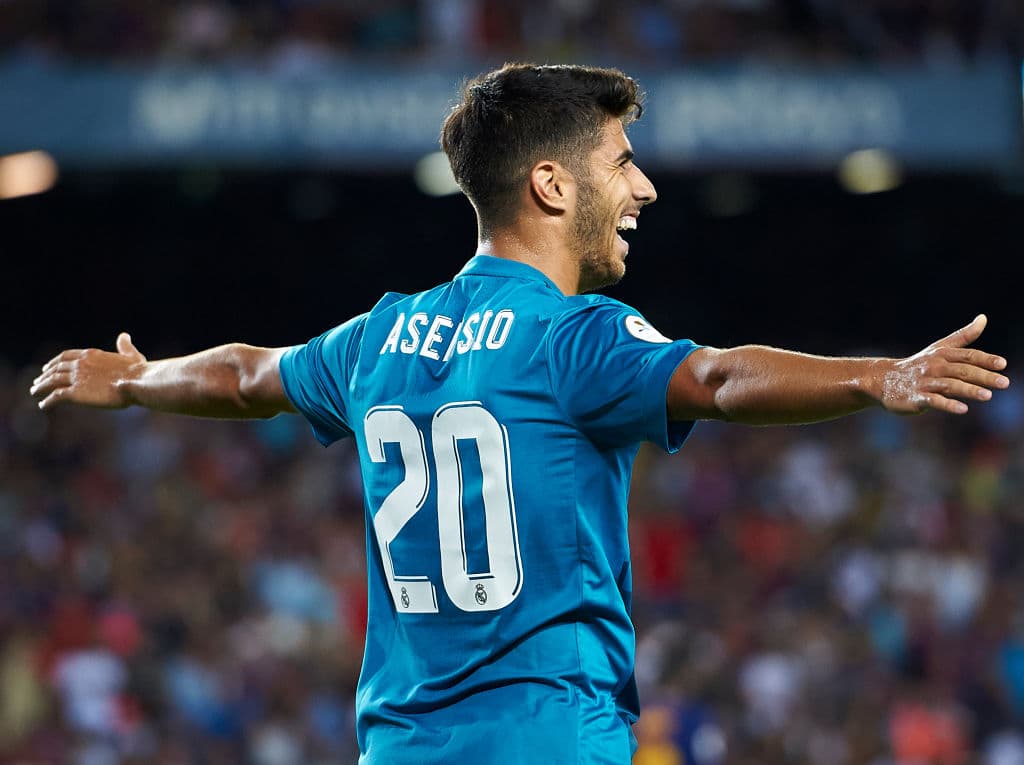 BARCELONA, SPAIN - AUGUST 13: Marco Asensio of Real Madrid celebrates after scoring the third goal during the Supercopa de Espana Supercopa Final 1st Leg match between FC Barcelona and Real Madrid at Camp Nou on August 13, 2017 in Barcelona, Spain. (Photo by fotopress/Getty Images)
