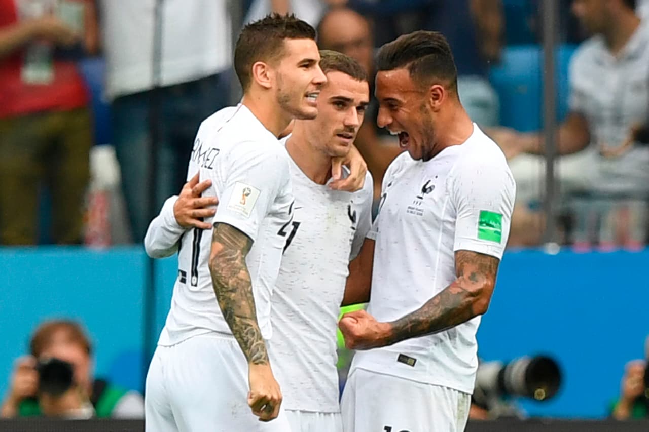 France's forward Antoine Griezmann (C) celebrates with teammates after scoring the team's second goal during the Russia 2018 World Cup quarter-final football match between Uruguay and France at the Nizhny Novgorod Stadium in Nizhny Novgorod on July 6, 2018. (Photo by Martin BERNETTI / AFP) (Photo credit should read MARTIN BERNETTI/AFP/Getty Images)