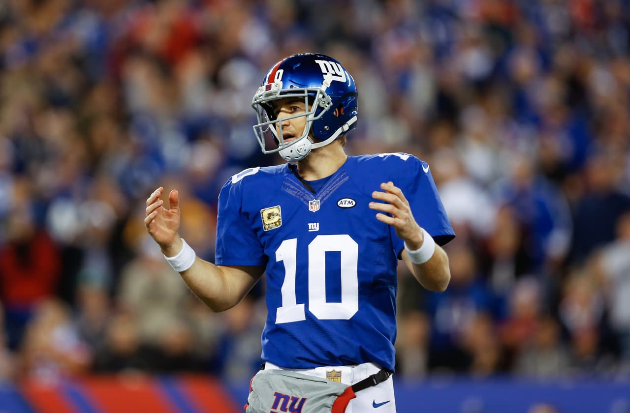 New York Giants quarterback Eli Manning (10) reacts during an NFL football game against the New England Patriots on Sunday, Nov. 15, 2015 in East Rutherford, N.J. (Aaron M. Sprecher via AP)