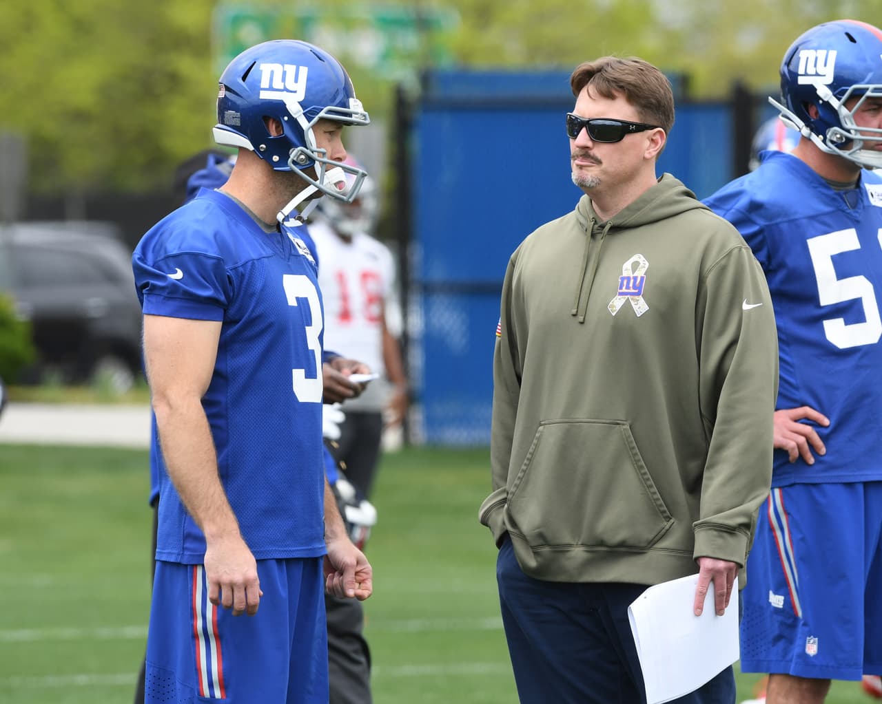 New York Giants head coach Ben McAdoo talks with kicker Josh Brown (3) during NFL mini-camp on April 27, 2016 at the Quest Diagnostics Training Center in East Rutherford, New Jersey. (Evan Pinkus via AP)