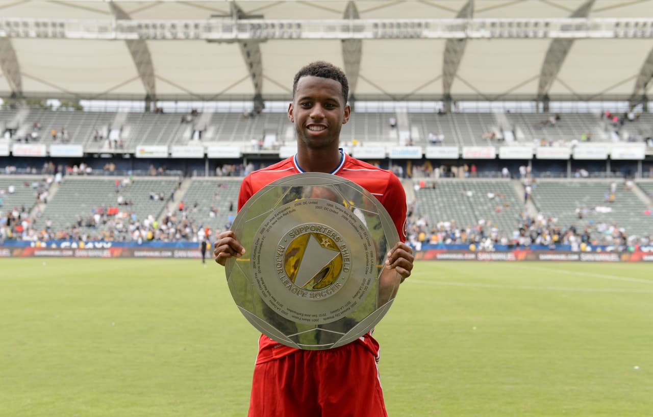 Oct 23, 2016; Carson, CA, USA; FC Dallas midfielder Kellyn Acosta (23) holds the Supporter's Shield after the game against the LA Galaxy at StubHub Center. The game ended in a draw 0-0. Mandatory Credit: Kelvin Kuo-USA TODAY Sports