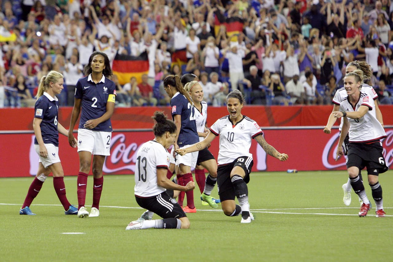 MONTREAL, QC - JUNE 26: Celia Sasic #13 of Germany celebrates her goal against France during the FIFA Women's World Cup Canada 2015 quarter final match between Germany and France at Olympic Stadium on June 26, 2015 in Montreal, Canada. (Photo by Francois Laplante/FreestylePhoto/Getty Images)