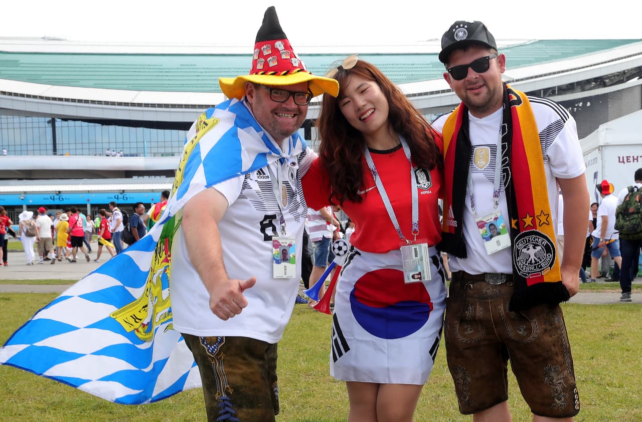 KAZAN, RUSSIA - JUNE 27: Fans of Korea Republic and Germany enjoy pre match atmosphere prior to the 2018 FIFA World Cup Russia group F match between Korea Republic and Germany at Kazan Arena on June 27, 2018 in Kazan, Russia. (Photo by Alexander Hassenstein/Getty Images, )