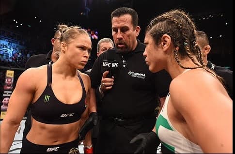 Rousey volvió a subir al octágono el 1 de agosto en Rio de Janeiro, Brasil, contra la local Beth Correia, quien prometió acabar con el reinado de la estadounidense.