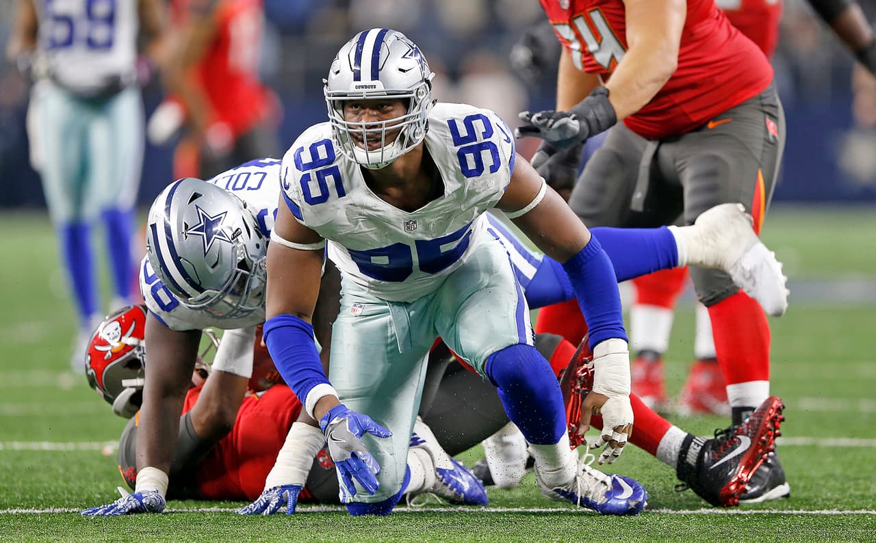Dallas Cowboys defensive end David Irving (95) and defensive tackle Maliek Collins (96) sack Tampa Bay Buccaneers quarterback Jameis Winston (3) during the 2016 NFL week 15 regular season game, Sunday, Dec. 18, 2016, in Arlington, Texas. The Cowboys defeated the Buccaneers, 26-20. (James D. Smith via AP)