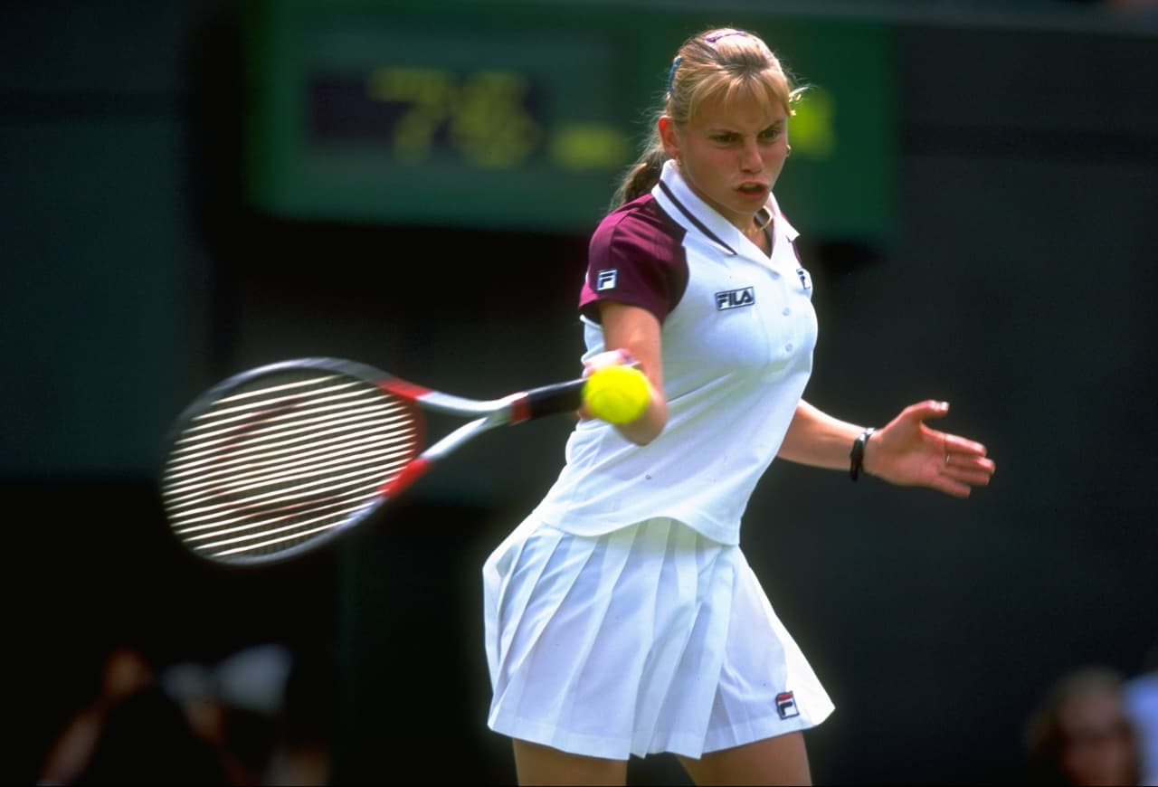 22 Jun 1999: Jelena Dokic of Australia on her way to the shock win over the number one seed Martina Hingis during the first round match on the second day of the Championships played at the All England Club in London, England. The shock win for Jelena Dokic sent shockwaves through the tennis ranks. \ Mandatory Credit: Gary M Prior/Allsport