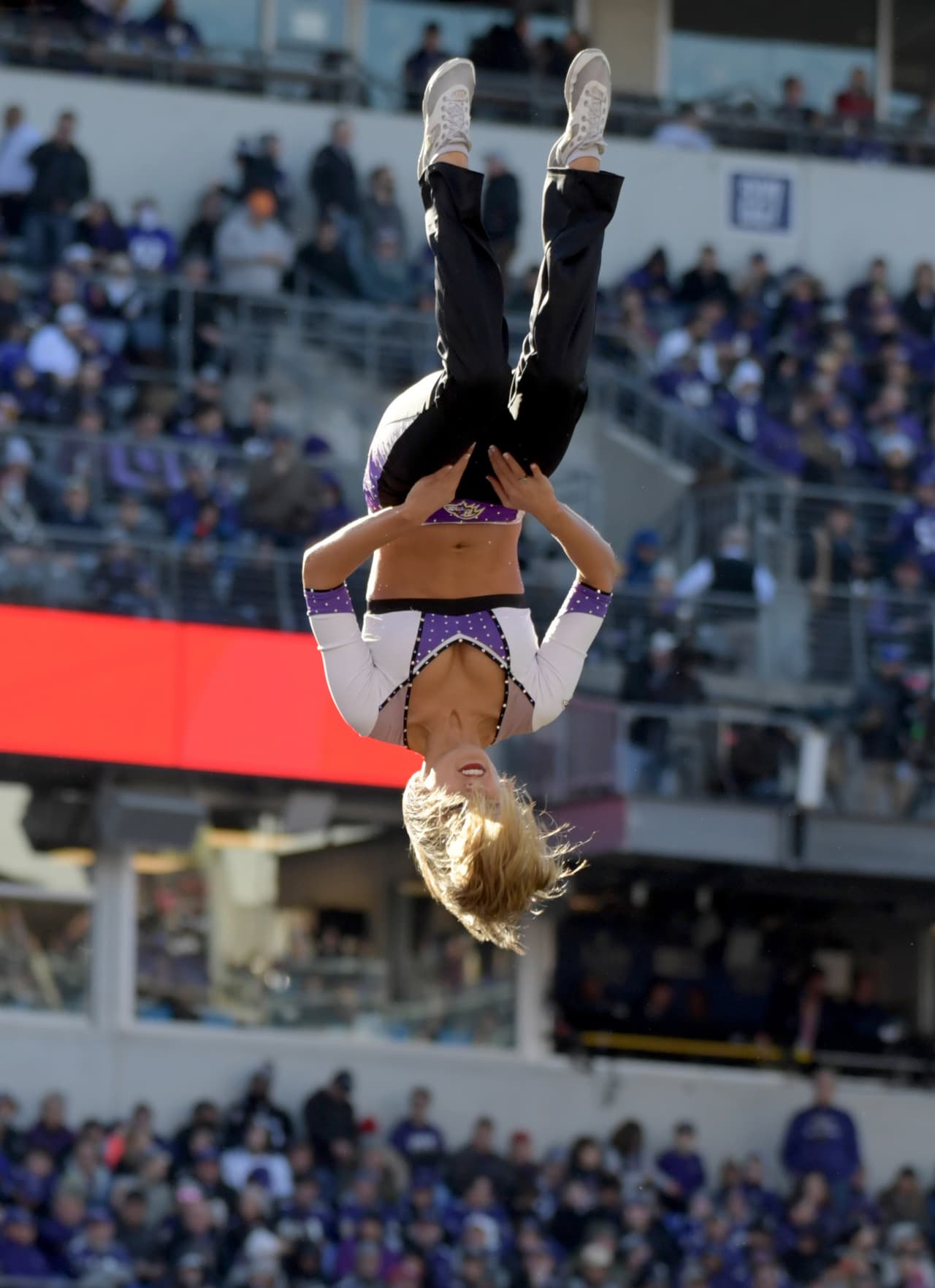 Jan 6, 2019; Baltimore, MD, USA; Baltimore Ravens cheerleader performs against the Los Angeles Chargers during an AFC Wild Card playoff football game at M&T Bank Stadium. Mandatory Credit: Kirby Lee-USA TODAY Sports