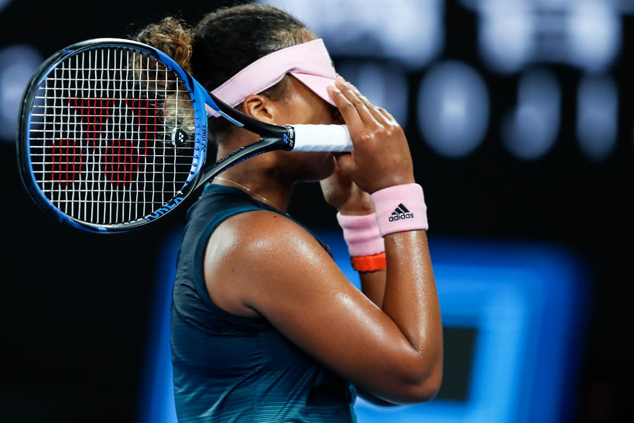 MELBOURNE, AUSTRALIA - JANUARY 24: Naomi Osaka of Japan reacts in her Women's Semi Final match against Karolina Pliskova of Czech Republic during day 11 of the 2019 Australian Open at Melbourne Park on January 24, 2019 in Melbourne, Australia. (Photo by Fred Lee/Getty Images)
