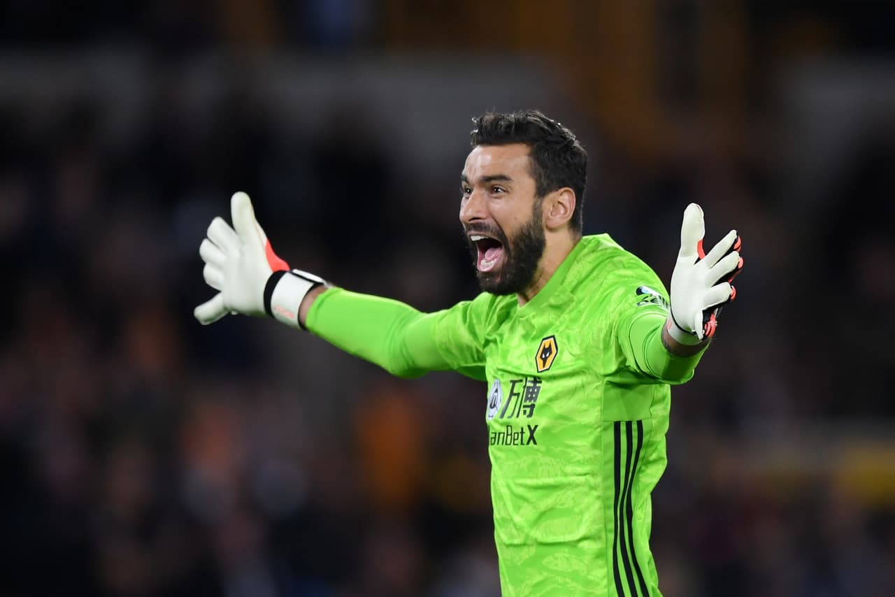 Rui Patricio celebra el gol de Raúl Jiménez.