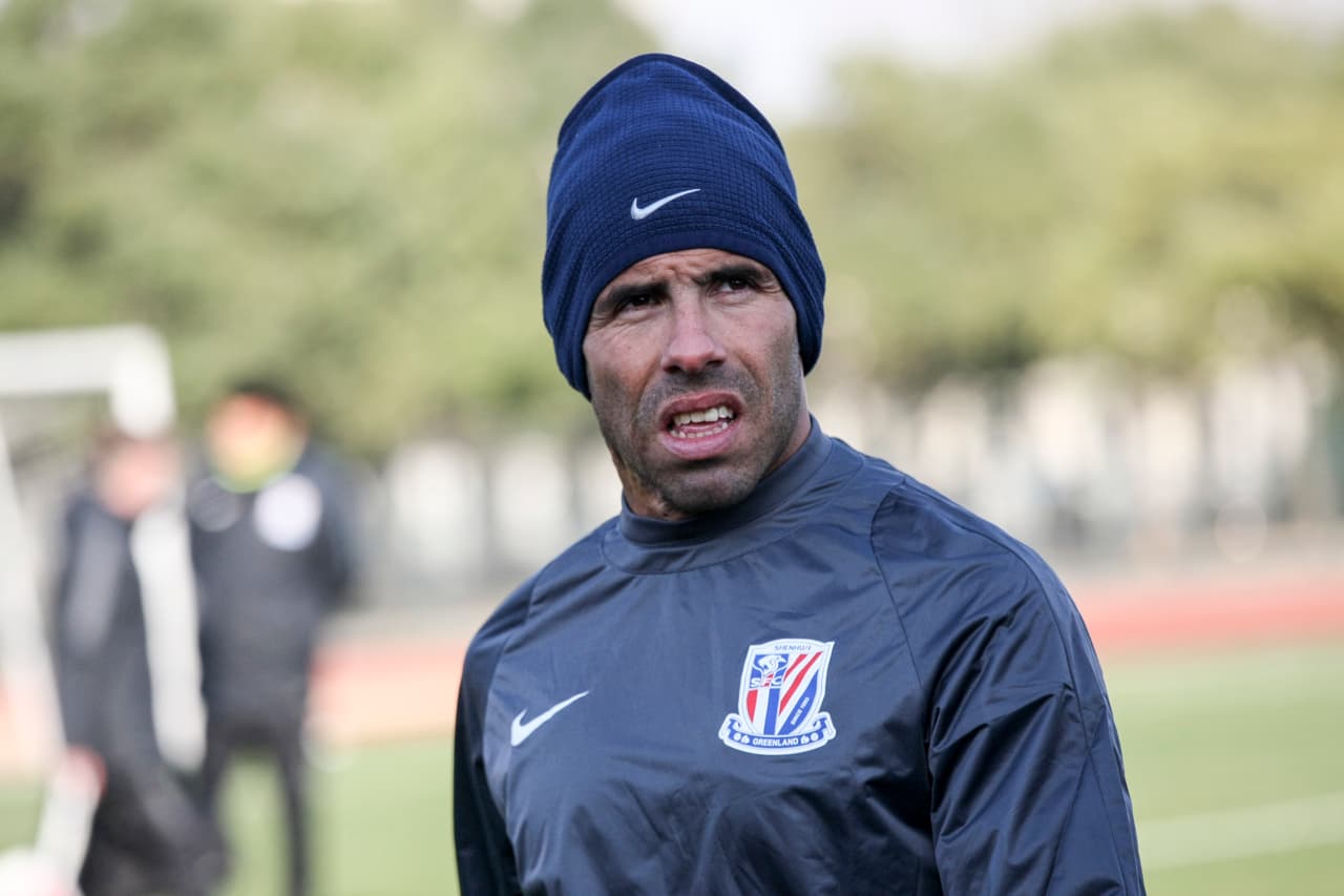 Argentine striker Carlos Tevez takes part in his first training session with his new club Shanghai Shenhua in Shanghai on January 21, 2017. / AFP / STR / China OUT (Photo credit should read STR/AFP/Getty Images)