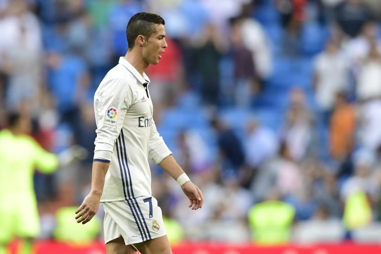 Real Madrid's Portuguese forward Cristiano Ronaldo walks at the end ofduring the Spanish league football match Real Madrid CF vs SD Eibar at the Santiago Bernabeu stadium in Madrid on October 2, 2016. / AFP / JAVIER SORIANO (Photo credit should read JAVIER SORIANO/AFP/Getty Images)