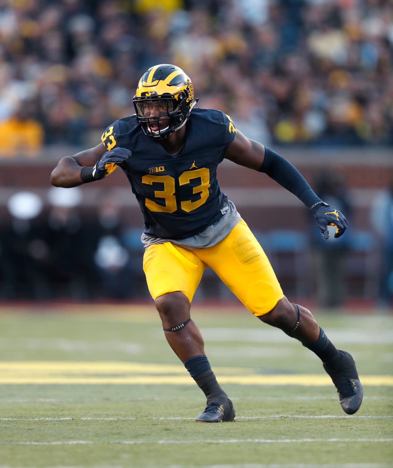 Michigan Wolverines defensive end Taco Charlton (33) plays against the Maryland Terrapins in the first half of an NCAA college football game in Ann Arbor, Mich., Saturday, Nov. 5, 2016. (AP Photo/Paul Sancya)