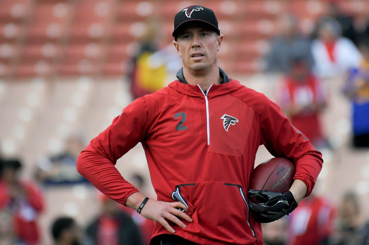 FILE - In this Jan. 6, 2018, file photo, Atlanta Falcons quarterback Matt Ryan watches during warm ups before an NFL wild-card playoff football game against the Los Angeles Rams, in Los Angeles. After missing practice on Tuesday, Jan. 9, 2018, for undisclosed personal reasons, Falcons quarterback Matt Ryan is expected back on Wednesday. It's an important practice day as Atlanta prepares for Saturday's divisional round playoff game at Philadelphia. (AP Photo/Mark J. Terrill, File)