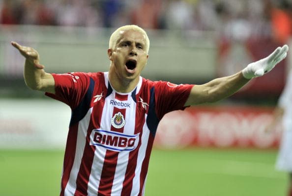 Adolfo Bautista from Mexico's Chivas de Guadalajara, celebrates his goal against Internacional from Brazil, in Zapopan, Jalisco State, Mexico, on August 11, 2010, during the first round of the Copa Libertadores final. AFP PHOTO/Hector Guerrero (Photo credit should read HECTOR GUERRERO/AFP/Getty Images)