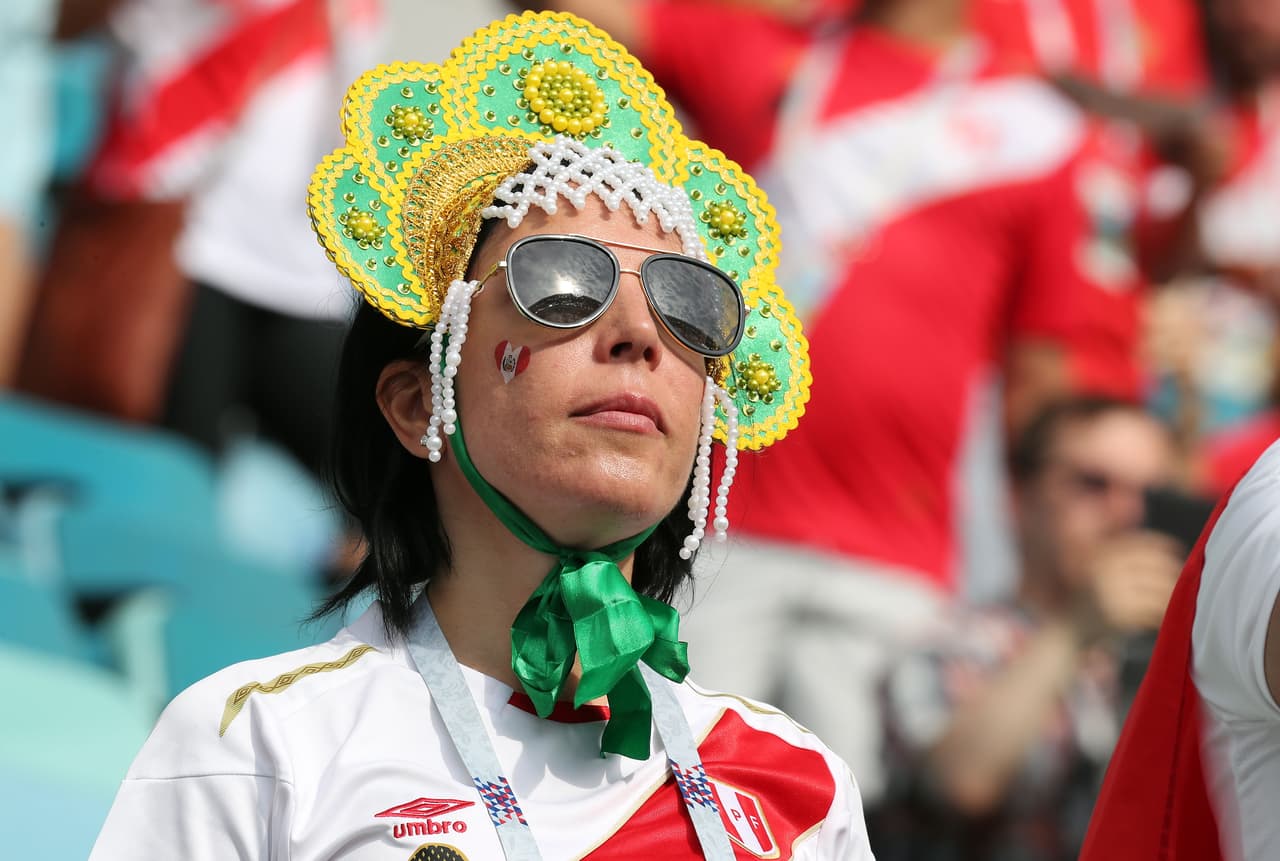 Sochi (Russian Federation), 26/06/2018.- Supporter of Peru during the FIFA World Cup 2018 group C preliminary round soccer match between Australia and Peru in Sochi, Russia, 26 June 2018. (RESTRICTIONS APPLY: Editorial Use Only, not used in association with any commercial entity - Images must not be used in any form of alert service or push service of any kind including via mobile alert services, downloads to mobile devices or MMS messaging - Images must appear as still images and must not emulate match action video footage - No alteration is made to, and no text or image is superimposed over, any published image which: (a) intentionally obscures or removes a sponsor identification image; or (b) adds or overlays the commercial identification of any third party which is not officially associated with the FIFA World Cup) (Mundial de Fútbol, Rusia) EFE/EPA/MOHAMED MESSARA EDITORIAL USE ONLY