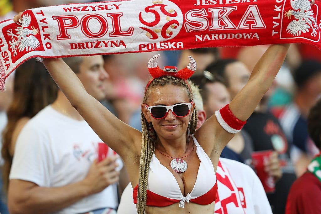 A Polish supporter cheers before the Euro 2016 quarter-final football match between Poland and Portugal at the Stade Velodrome in Marseille on June 30, 2016. / AFP / Valery HACHE (Photo credit should read VALERY HACHE/AFP/Getty Images)