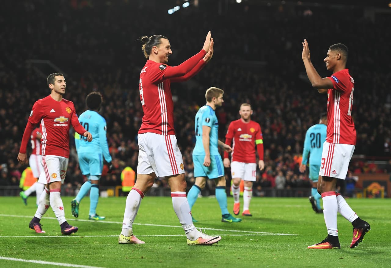 MANCHESTER, ENGLAND - NOVEMBER 24: Zlatan Ibrahimovic and Marcus Rashford of Manchester United celebrate as Brad Jones of Feyenoord scores an own goal for their third during the UEFA Europa League Group A match between Manchester United FC and Feyenoord at Old Trafford on November 24, 2016 in Manchester, England. (Photo by Gareth Copley/Getty Images)