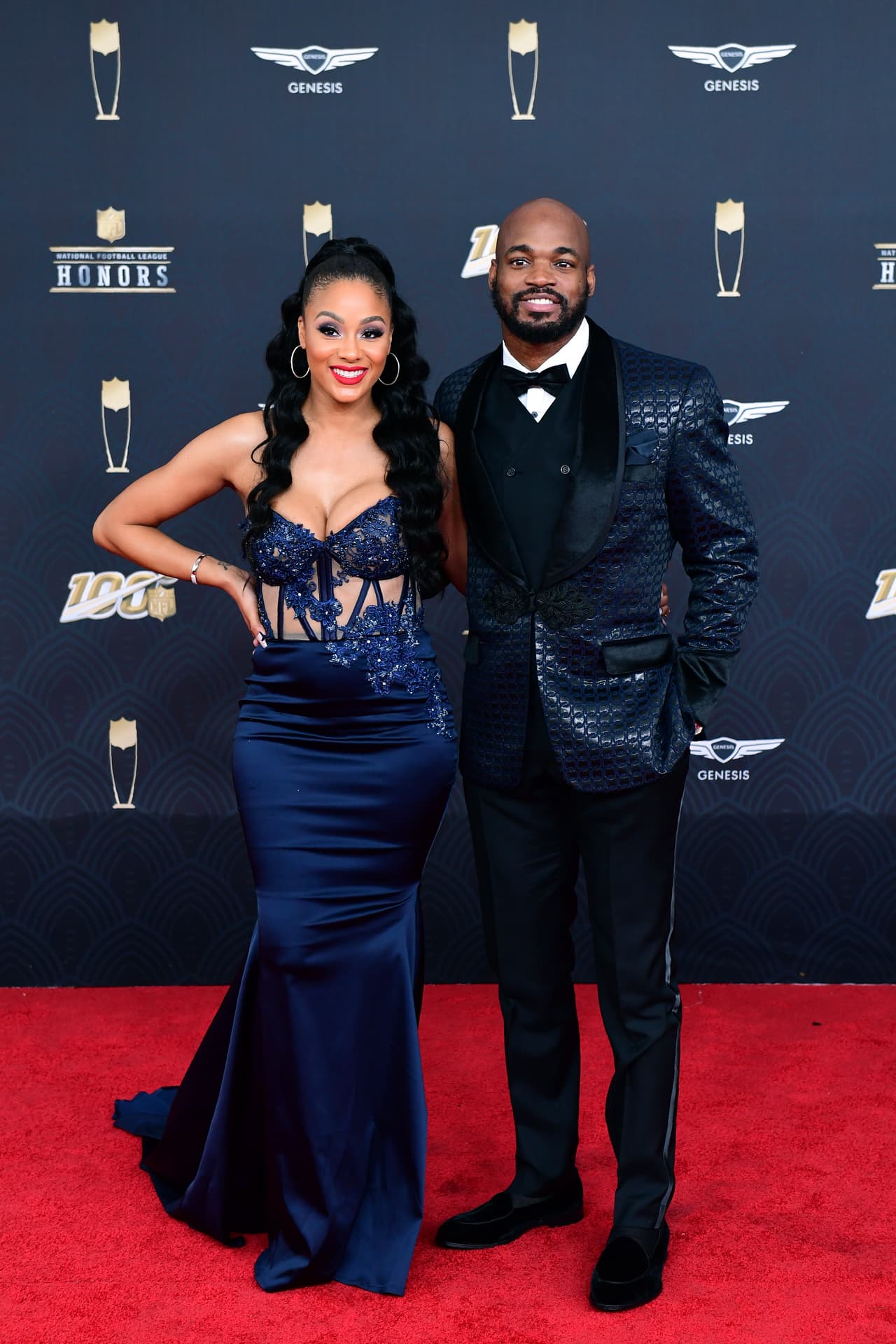 Ashley Brown y Adrian Peterson