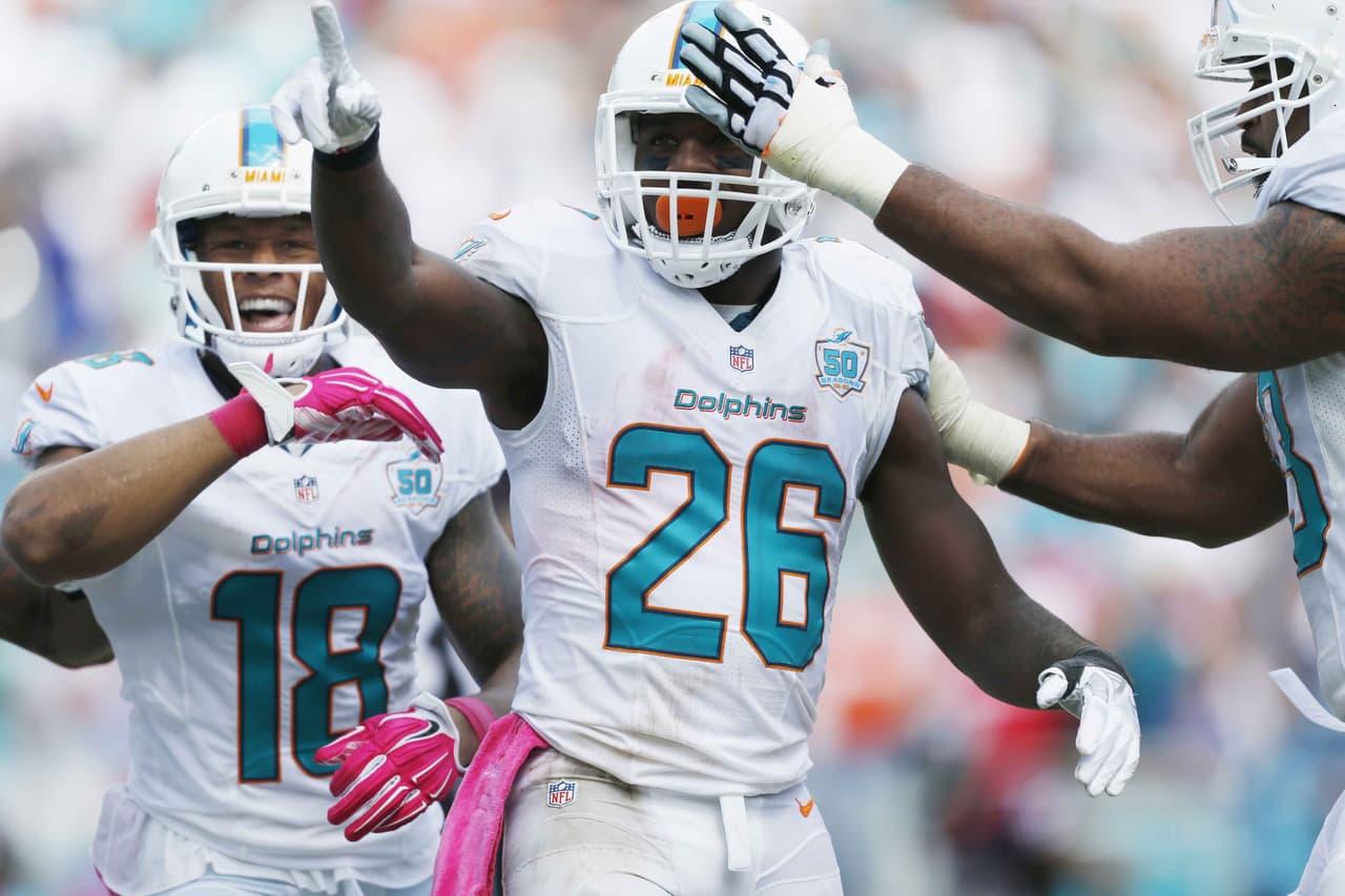 Lamar Miller sumó 236 yardas desde la línea de golpeo y dos touchdowns para llevar a los Dolphins a apalear 44-26 a los Texans.