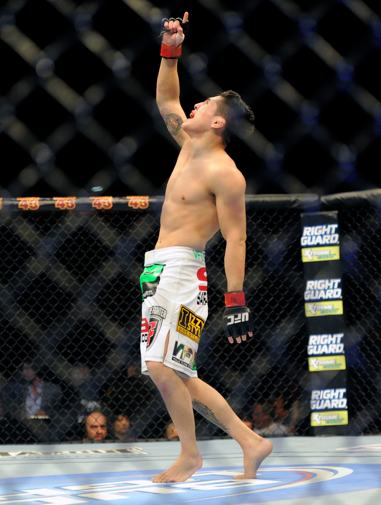 Erik Perez reacts after winning his UFC 155 bantamweight bout against Byron Bloodworth at the MGM Grand Garden Arena Saturday, Dec, 29, 2012 in Las Vegas. Perez won by a technical knock out in the first round. (AP Photo/David Becker)