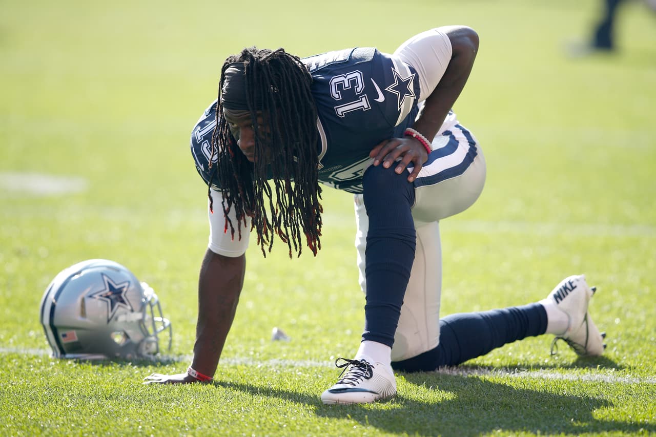 Dallas Cowboys wide receiver Lucky Whitehead (13) looks on as he stretches in pre game warm ups during a week 9 NFL football game against the Cleveland Browns, Sunday, Nov 6, 2016, in Cleveland. The Cowboys won 35-10. (Scott Boehm via AP)
